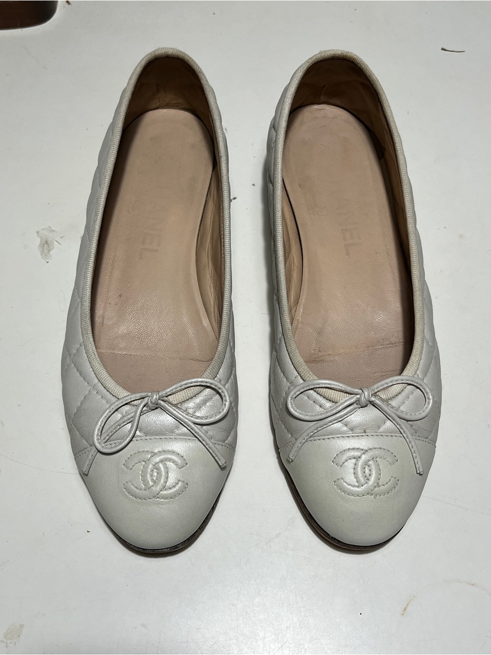CHANEL Cream Quilted Leather Ballet Flats with CC Bow